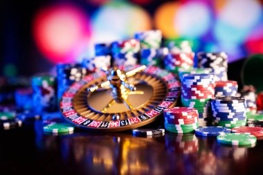 SA Gaming baccarat table with betting layout and live dealer
